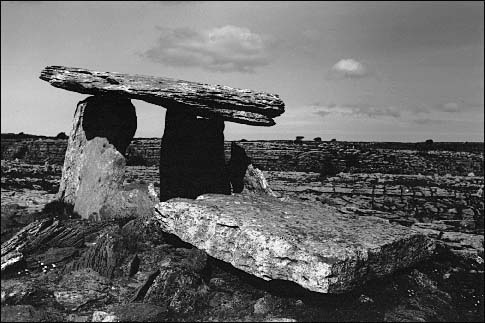 Black and white photograph of Poulnabrone Dolmen.